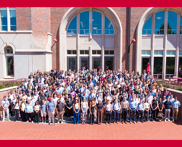 incoming students on steps in front of Sturm College of Law building