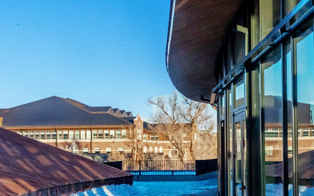 law building and reflection in window