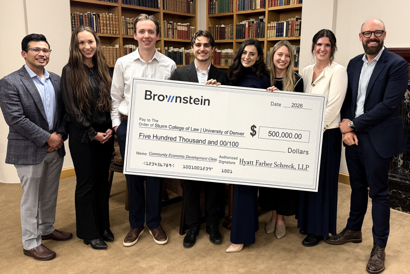 CEDC group photo with oversized check from Brownstein